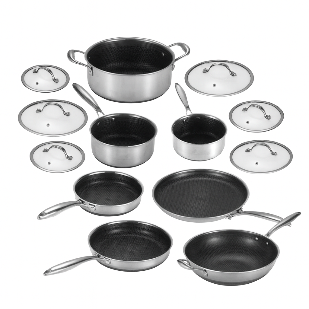 Set of cookware including pots, pans, and lids on a white background