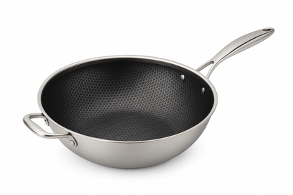 Stainless steel wok with a honeycomb pattern on a white background