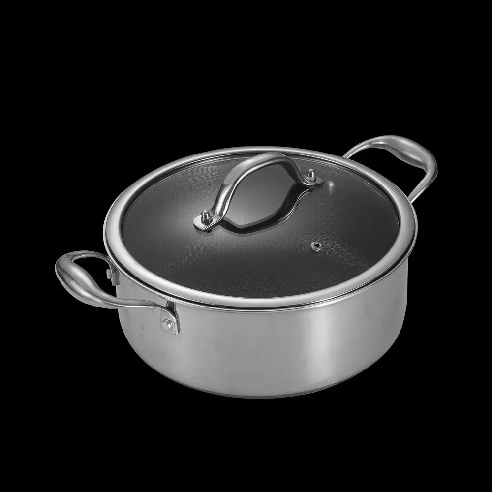 Stainless steel pot with lid on a black background